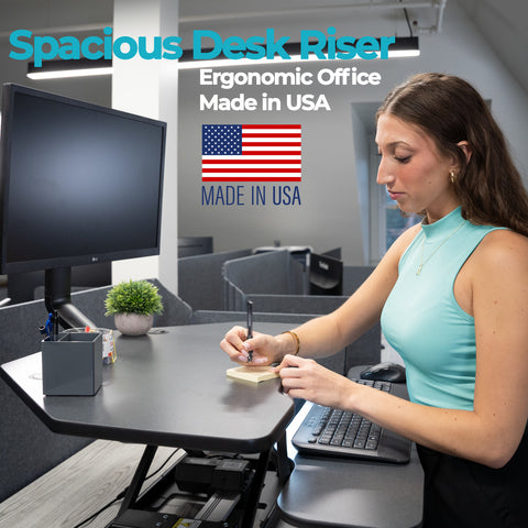 Image of VersaDesk PowerPro® Corner Electric Standing Desk Converter with USB Charging