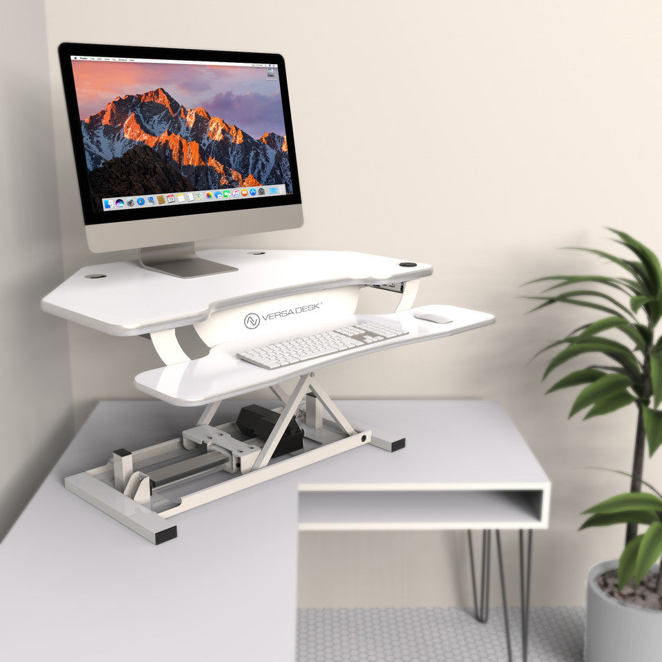 VersaDesk PowerPro® Corner Electric Standing Desk Converter with USB Charging